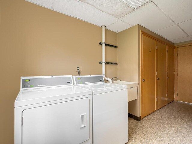 4600 Cedar Lake Rd S Unit 6, Saint Louis Park, MN 55416 - shared laundry room with separate washer and dryer and light floors