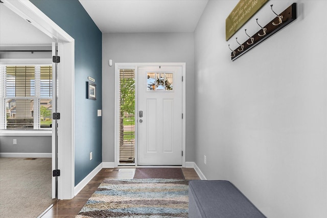 11444 Creekside Ct, Rogers, MN 55311 - foyer entrance with baseboards and dark wood-style flooring