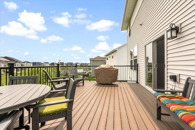 11444 Creekside Ct, Rogers, MN 55311 - wooden terrace with a residential view, grilling area, and outdoor dining space