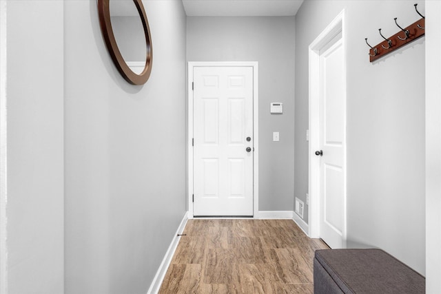 11444 Creekside Ct, Rogers, MN 55311 - doorway featuring baseboards