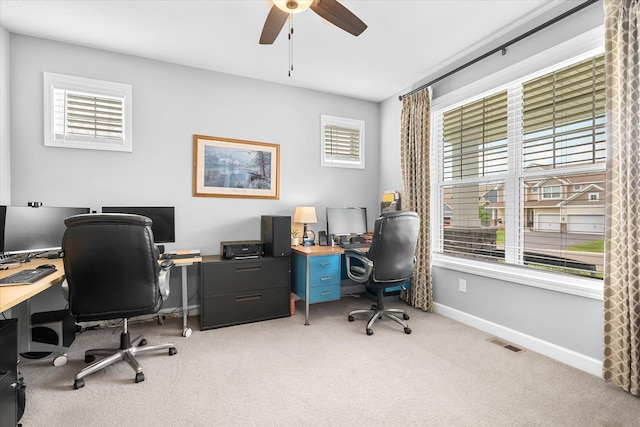 11444 Creekside Ct, Rogers, MN 55311 - home office featuring light colored carpet, ceiling fan, and baseboards