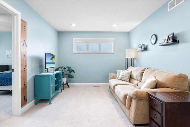 11444 Creekside Ct, Rogers, MN 55311 - living room with light colored carpet, baseboards, and recessed lighting