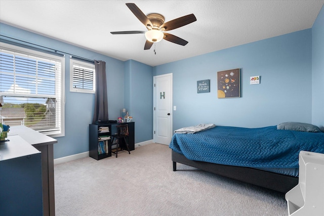 11444 Creekside Ct, Rogers, MN 55311 - bedroom with light colored carpet, ceiling fan, and baseboards