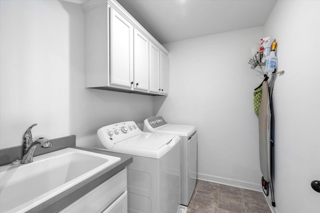 11444 Creekside Ct, Rogers, MN 55311 - laundry room featuring cabinet space, washing machine and dryer, and baseboards