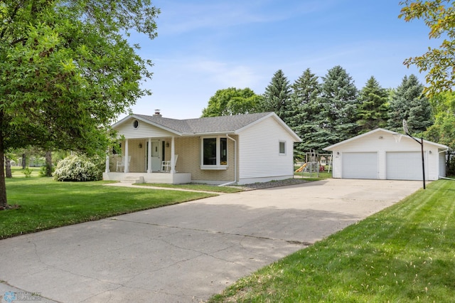 1311 Joseph St, Hawley, MN 56549 - ranch-style house featuring covered porch, a detached garage, an outbuilding, a front yard, and brick siding