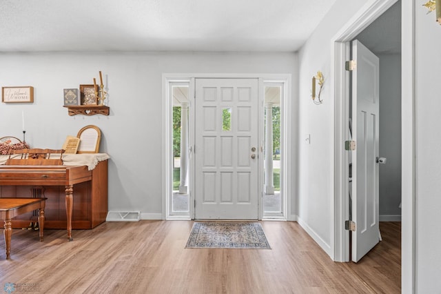 1311 Joseph St, Hawley, MN 56549 - foyer entrance with wood finished floors and baseboards