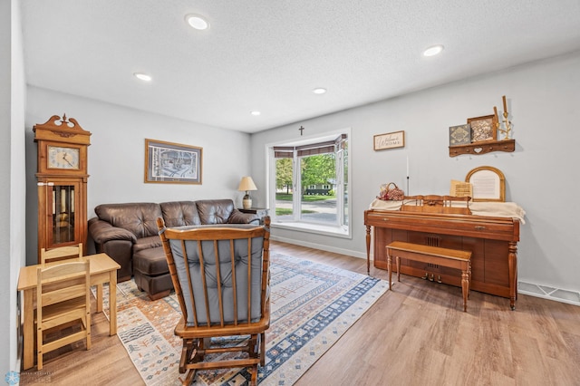 1311 Joseph St, Hawley, MN 56549 - living room featuring light wood-style flooring, recessed lighting, and baseboards