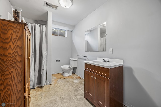 1311 Joseph St, Hawley, MN 56549 - bathroom featuring vanity, toilet, a shower with curtain, and baseboards