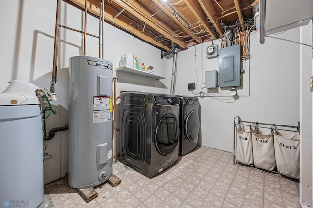 1311 Joseph St, Hawley, MN 56549 - laundry area featuring water heater, independent washer and dryer, electric panel, and light flooring