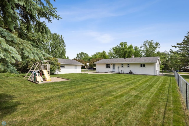 1311 Joseph St, Hawley, MN 56549 - back of house featuring a playground