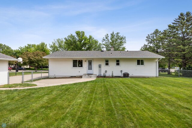 1311 Joseph St, Hawley, MN 56549 - back of property featuring a patio and a chimney
