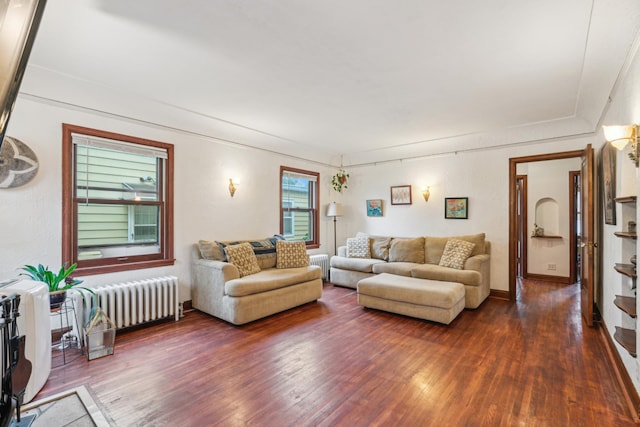 5705 36th Ave S, Minneapolis, MN 55417 - living area featuring radiator and wood finished floors