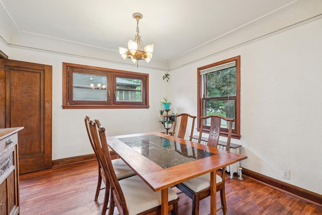 5705 36th Ave S, Minneapolis, MN 55417 - dining area featuring a chandelier and dark wood finished floors