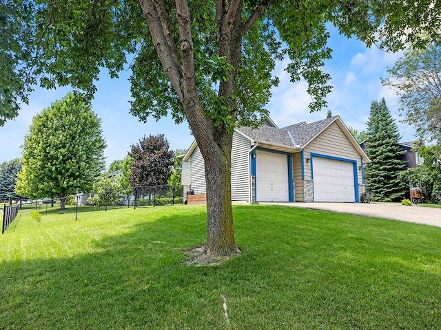 201 3rd St NW, Saint Michael, MN 55376 - view of front of property with a garage