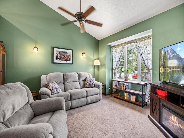 201 3rd St NW, Saint Michael, MN 55376 - carpeted living room with lofted ceiling, ceiling fan, a glass covered fireplace, and a textured ceiling