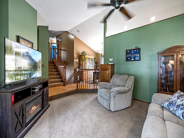 201 3rd St NW, Saint Michael, MN 55376 - living room featuring carpet floors, a ceiling fan, lofted ceiling, and a chandelier