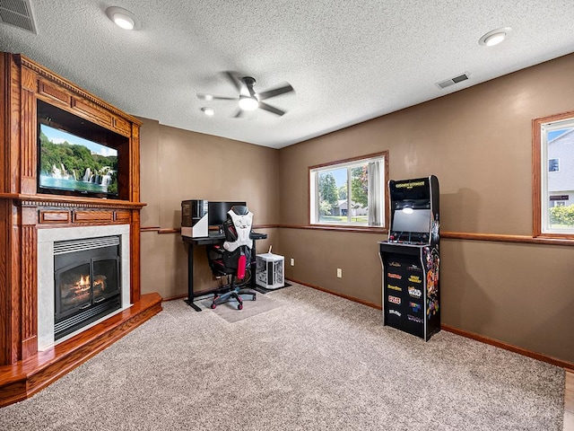 201 3rd St NW, Saint Michael, MN 55376 - carpeted office with a ceiling fan, a fireplace, and a textured ceiling