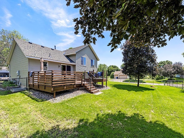 201 3rd St NW, Saint Michael, MN 55376 - rear view of property with a wooden deck and roof with shingles