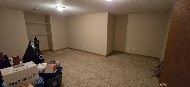 4708 21st St N, Moorhead, MN 56560 - interior space with a textured ceiling, carpet floors, and baseboards
