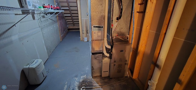 4708 21st St N, Moorhead, MN 56560 - detailed view of unfinished concrete flooring and heating unit