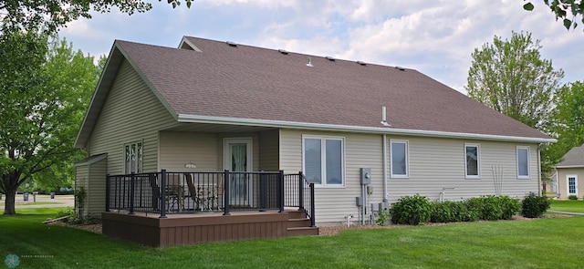 4708 21st St N, Moorhead, MN 56560 - back of property with a yard and a wooden deck