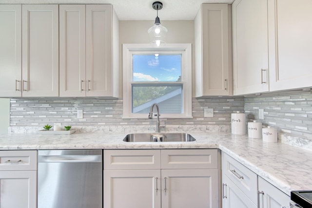 1414 5th Ave SW, Rochester, MN 55902 - kitchen with stainless steel dishwasher, a sink, and tasteful backsplash