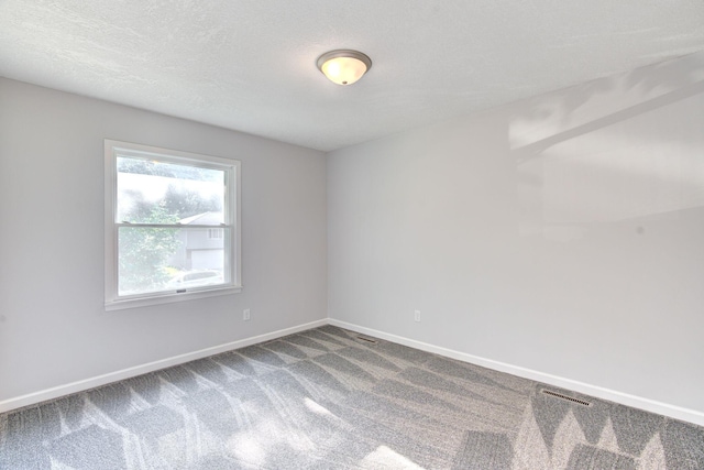 1414 5th Ave SW, Rochester, MN 55902 - spare room with carpet and baseboards