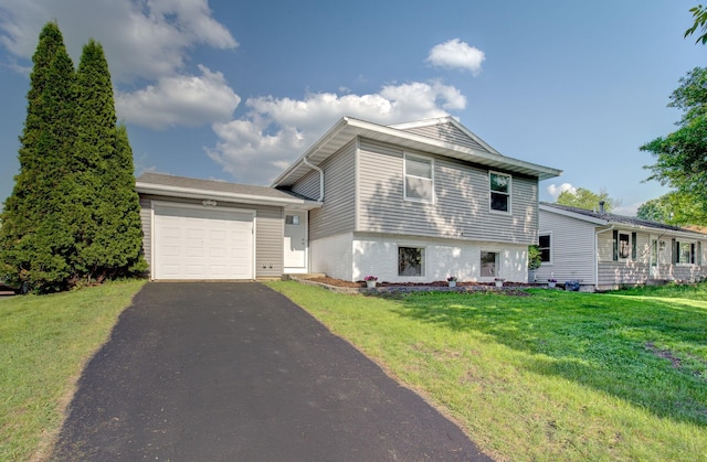 1414 5th Ave SW, Rochester, MN 55902 - tri-level home with an attached garage, driveway, and a front yard