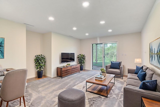 1414 5th Ave SW, Rochester, MN 55902 - living area with recessed lighting, baseboards, and light carpet