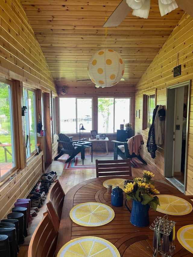 1760 Grindstone Is, International Falls, MN 56649 - living room featuring healthy amount of natural light, wooden ceiling, wood-type flooring, wooden walls, and high vaulted ceiling