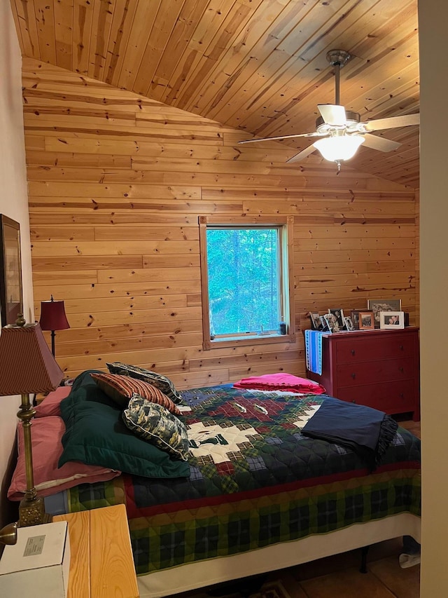 1760 Grindstone Is, International Falls, MN 56649 - bedroom with wooden ceiling, lofted ceiling, wood walls, and a ceiling fan