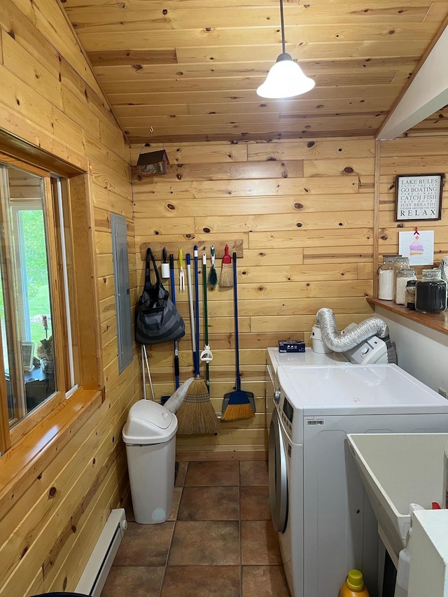 1760 Grindstone Is, International Falls, MN 56649 - laundry room featuring wooden ceiling, wooden walls, separate washer and dryer, baseboard heating, and dark tile patterned floors