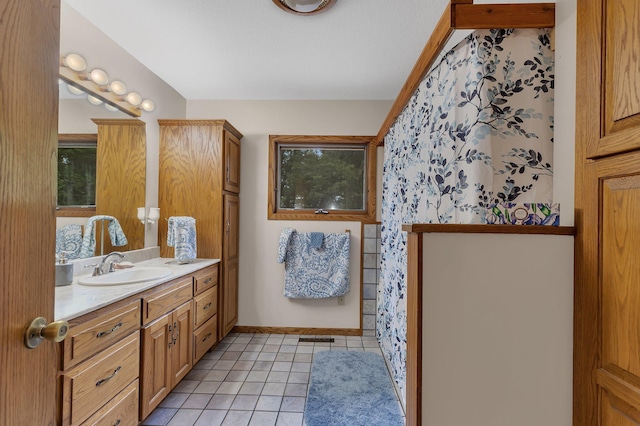 3566 State Highway 210, Baxter, MN 56425 - full bath with vanity, tile patterned floors, a shower, and baseboards