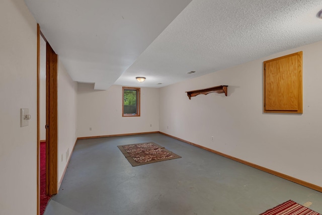 3566 State Highway 210, Baxter, MN 56425 - below grade area with baseboards and a textured ceiling