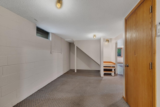 3566 State Highway 210, Baxter, MN 56425 - below grade area with carpet floors, stairs, a textured ceiling, concrete block wall, and plenty of natural light