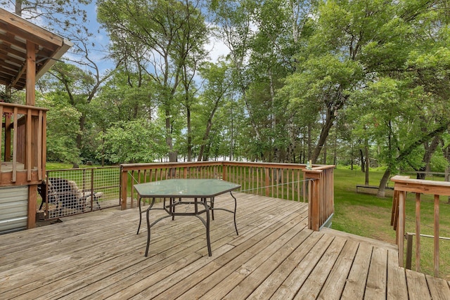 3566 State Highway 210, Baxter, MN 56425 - deck featuring a lawn, outdoor dining area, and view of scattered trees