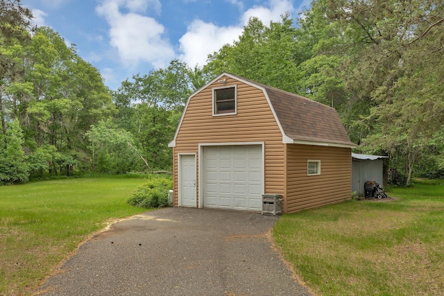 3566 State Highway 210, Baxter, MN 56425 - detached garage with a view of trees and driveway