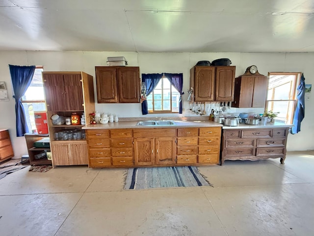 42810 620th Ave, Wadena, MN 56477 - kitchen with light countertops, concrete floors, plenty of natural light, and a sink