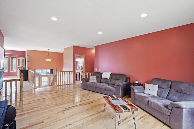 26722 Rabbit Trl, Stanford Twp, MN 55398 - living area with wood finished floors and recessed lighting