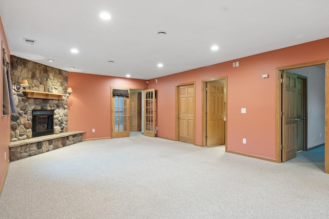26722 Rabbit Trl, Stanford Twp, MN 55398 - unfurnished living room with light carpet, recessed lighting, and a fireplace