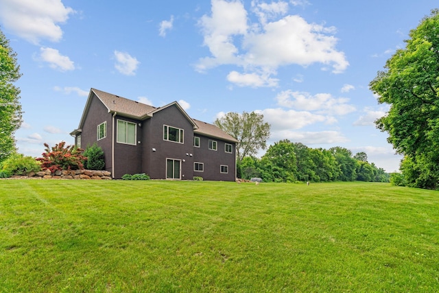 26722 Rabbit Trl, Stanford Twp, MN 55398 - back of house with a lawn
