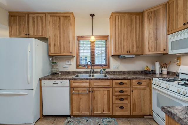 242 Skyview Ln, Mankato, MN 56001 - kitchen featuring white appliances, a sink, dark countertops, decorative light fixtures, and light tile patterned floors