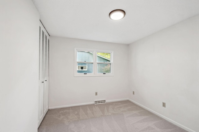 1173 Jefferson St S, Shakopee, MN 55379 - unfurnished bedroom featuring baseboards, a closet, and carpet flooring