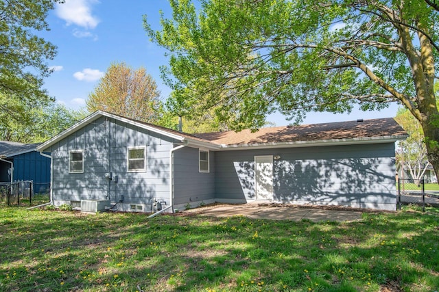 1173 Jefferson St S, Shakopee, MN 55379 - back of property with central AC unit and a patio