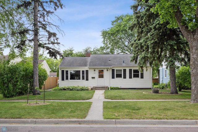 1514 2nd St N, Fargo, ND 58102 - view of front of home with a chimney