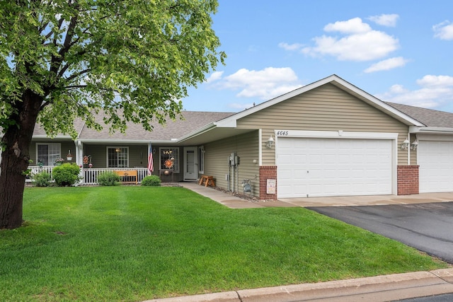 4645 Eagle Ridge Ln, Monticello, MN 55362 - ranch-style home featuring brick siding, a front lawn, covered porch, and roof with shingles