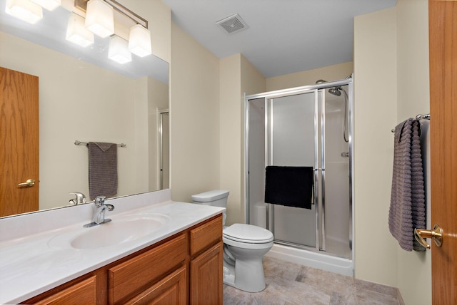 4645 Eagle Ridge Ln, Monticello, MN 55362 - full bathroom featuring a shower stall, vanity, toilet, and tile patterned flooring