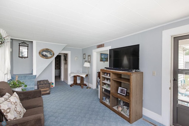 425 12th Ave S, Fargo, ND 58103 - carpeted living area featuring crown molding and baseboards