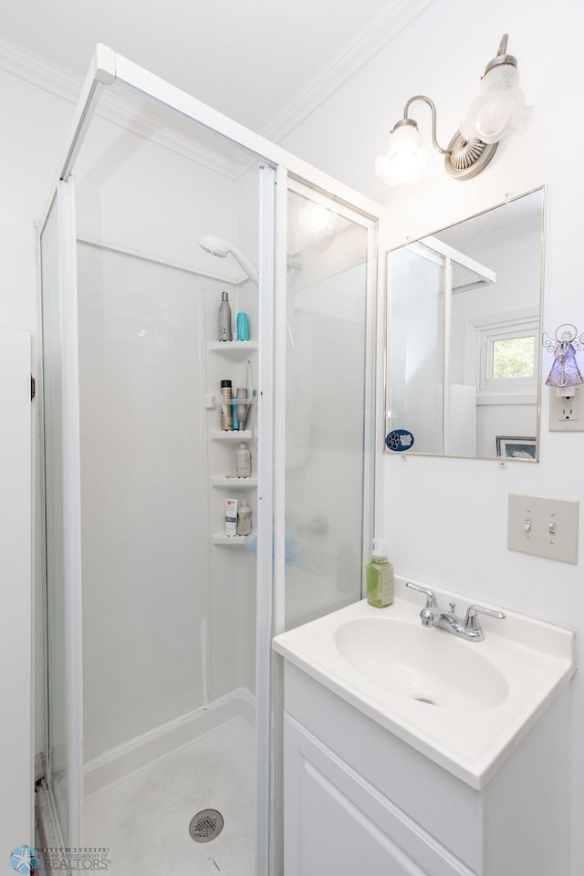 425 12th Ave S, Fargo, ND 58103 - full bath featuring a shower stall, vanity, and ornamental molding