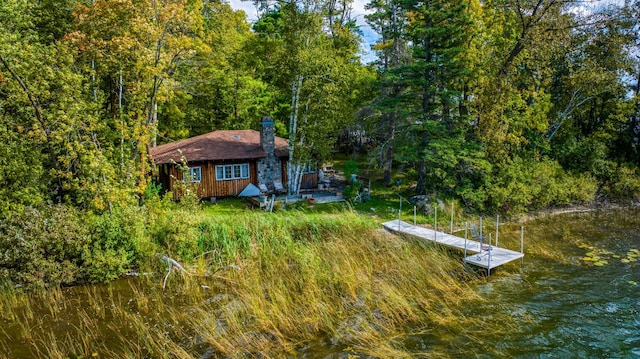4050 Gryce Styne Rd NE, Bemidji, MN 56601 - dock with a forest view and a water view